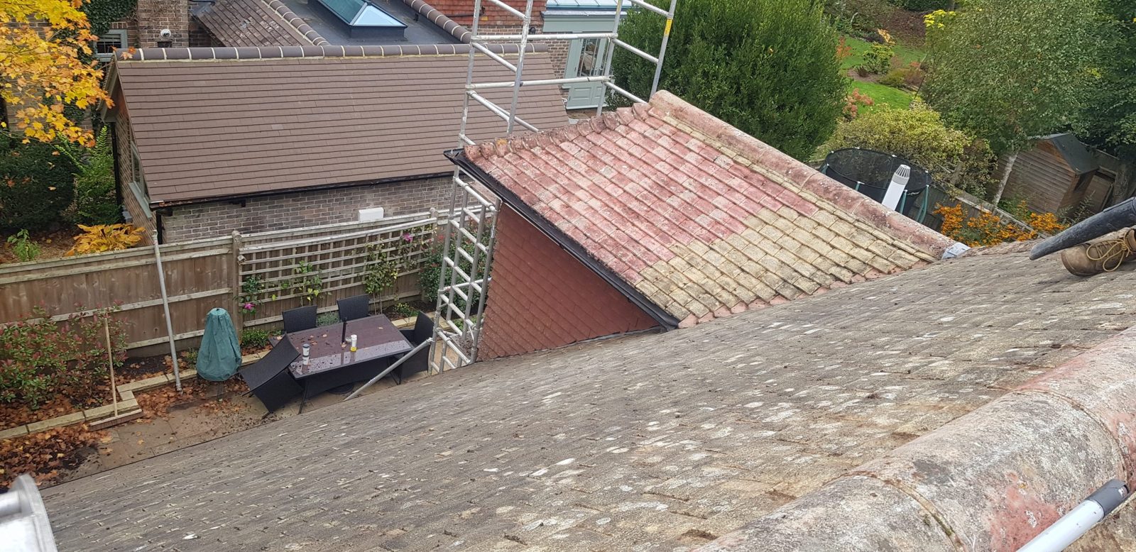 Roof cleaning and treated with an antifungal moss wash